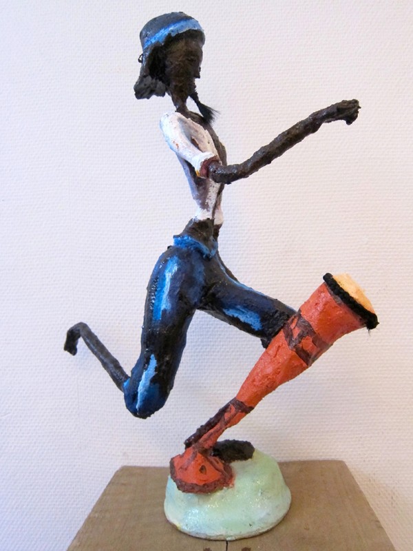 Rhode Makoumbou › Beeldhouwwerk: «Le joueur de tam-tam» (2011)