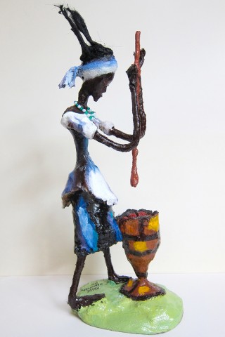Rhode Makoumbou › Sculpture : «La pileuse» • ID › 267